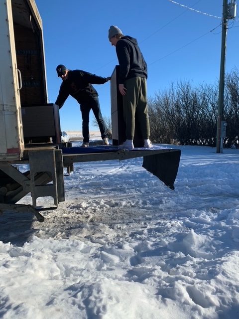 Movers on a Moving Truck