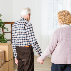 Seniors with Moving Boxes