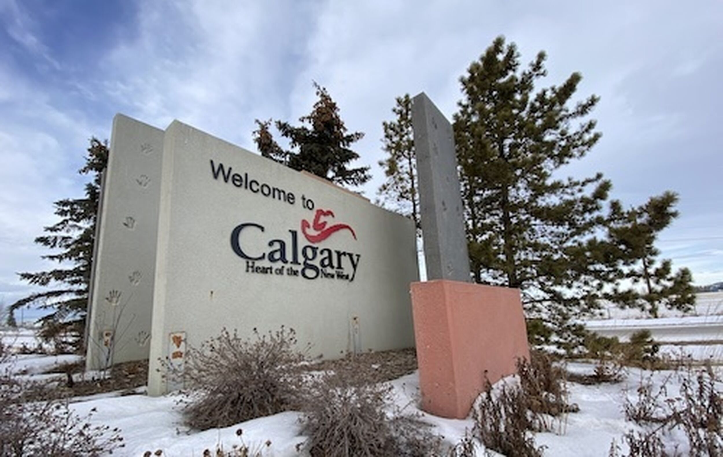 Welcome sign for Calgary, snowy landscape