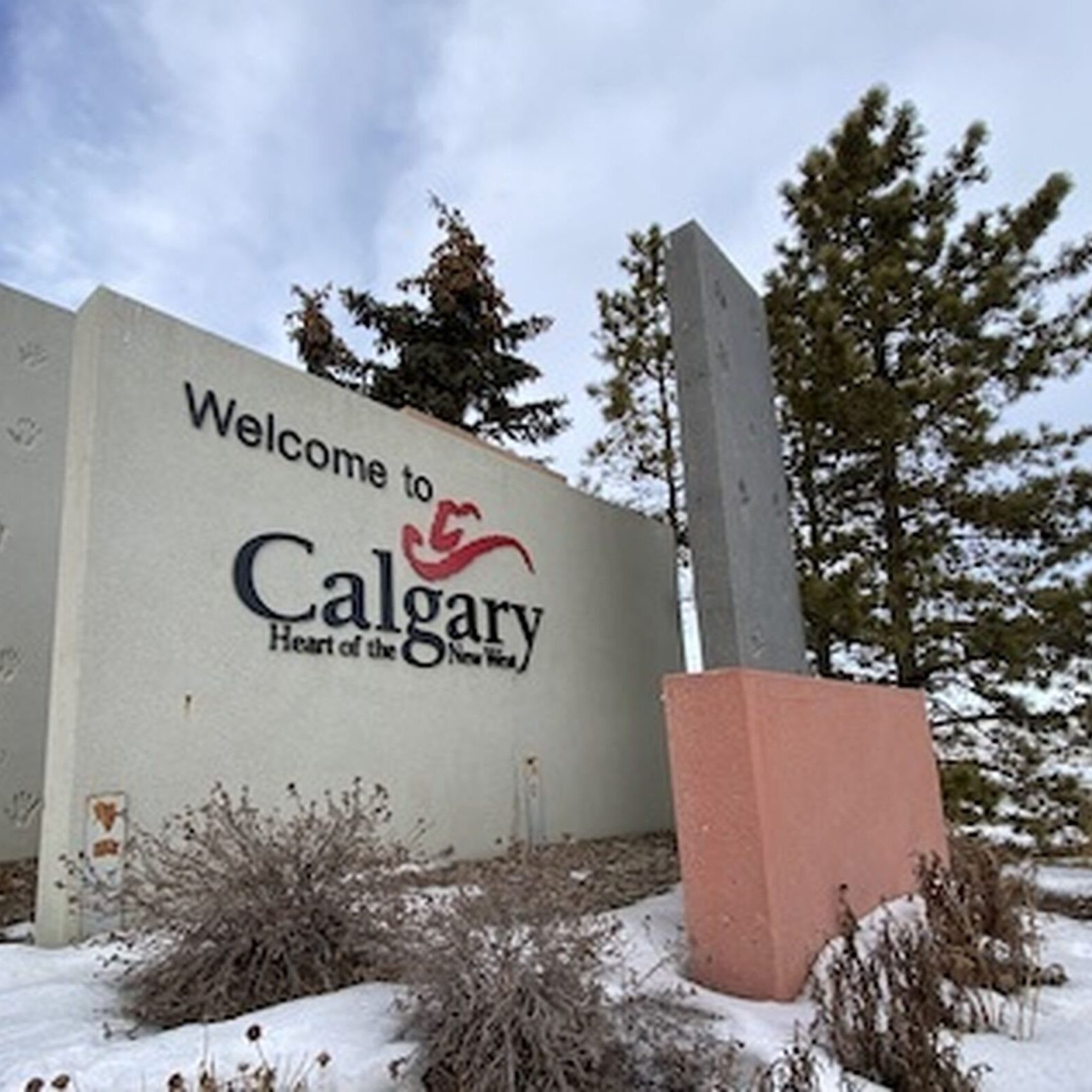 Welcome sign for Calgary, snowy landscape